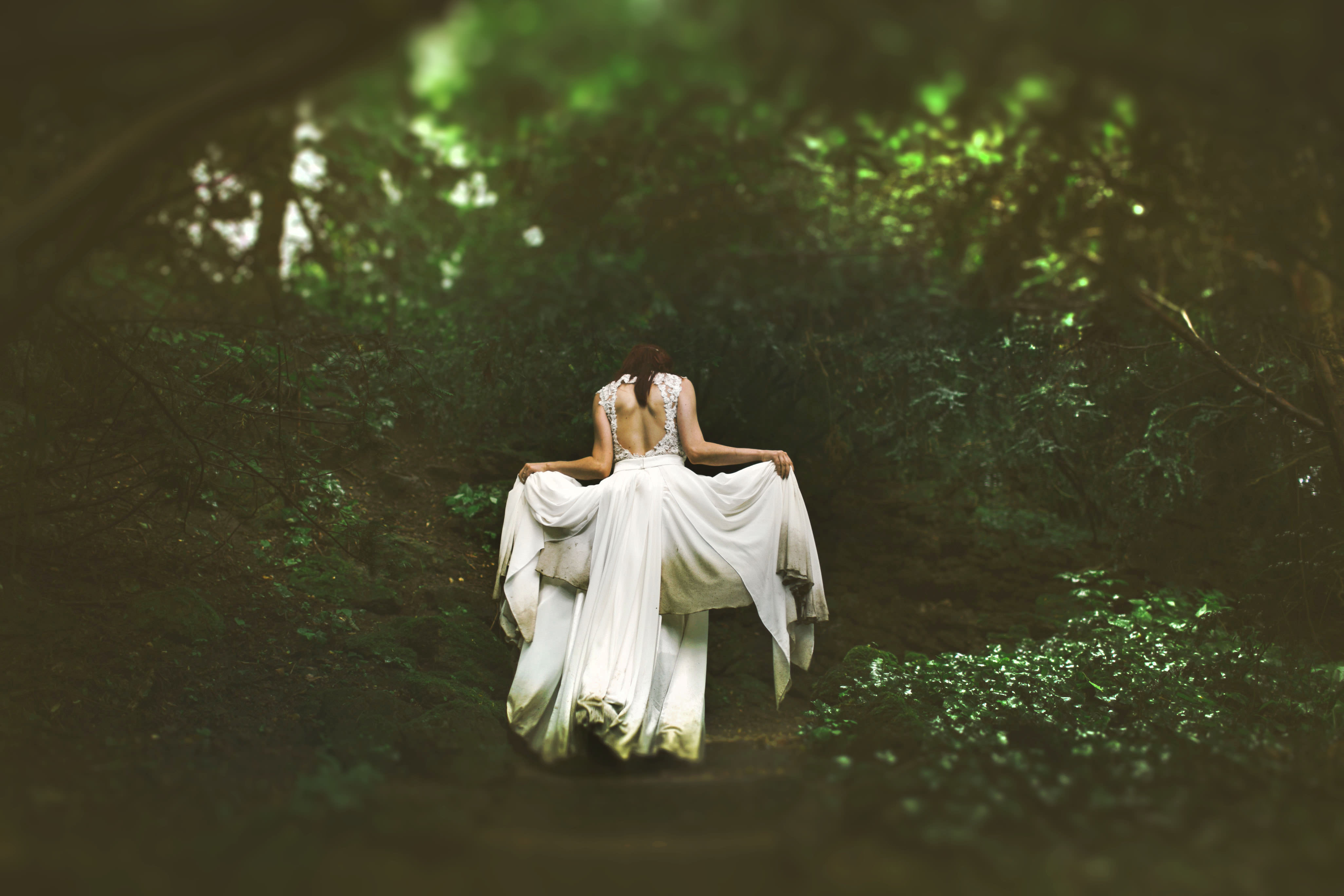 Ethereal Bride Running Through the Forest